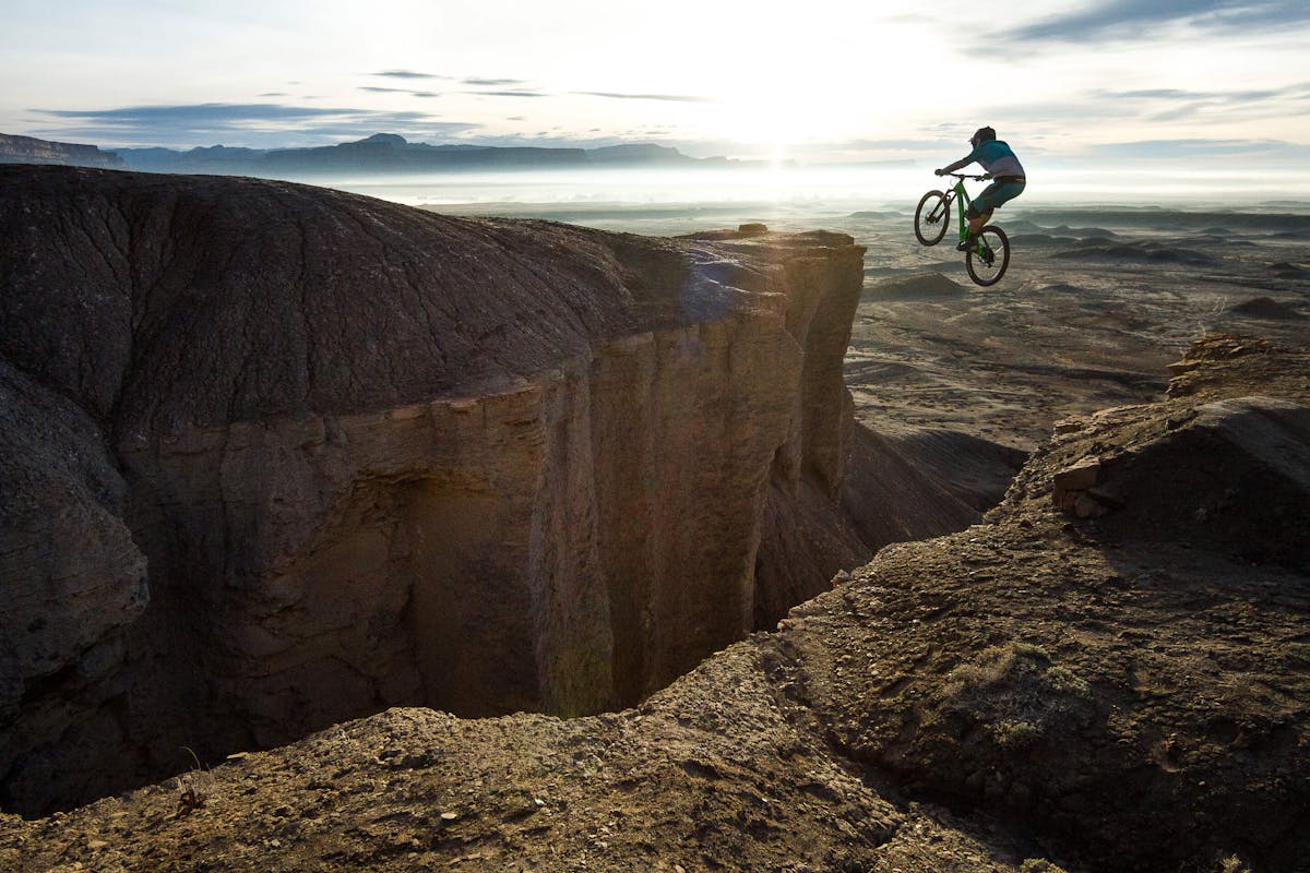 Shawn Neer hitting a massive gap jump in Green River, Utah