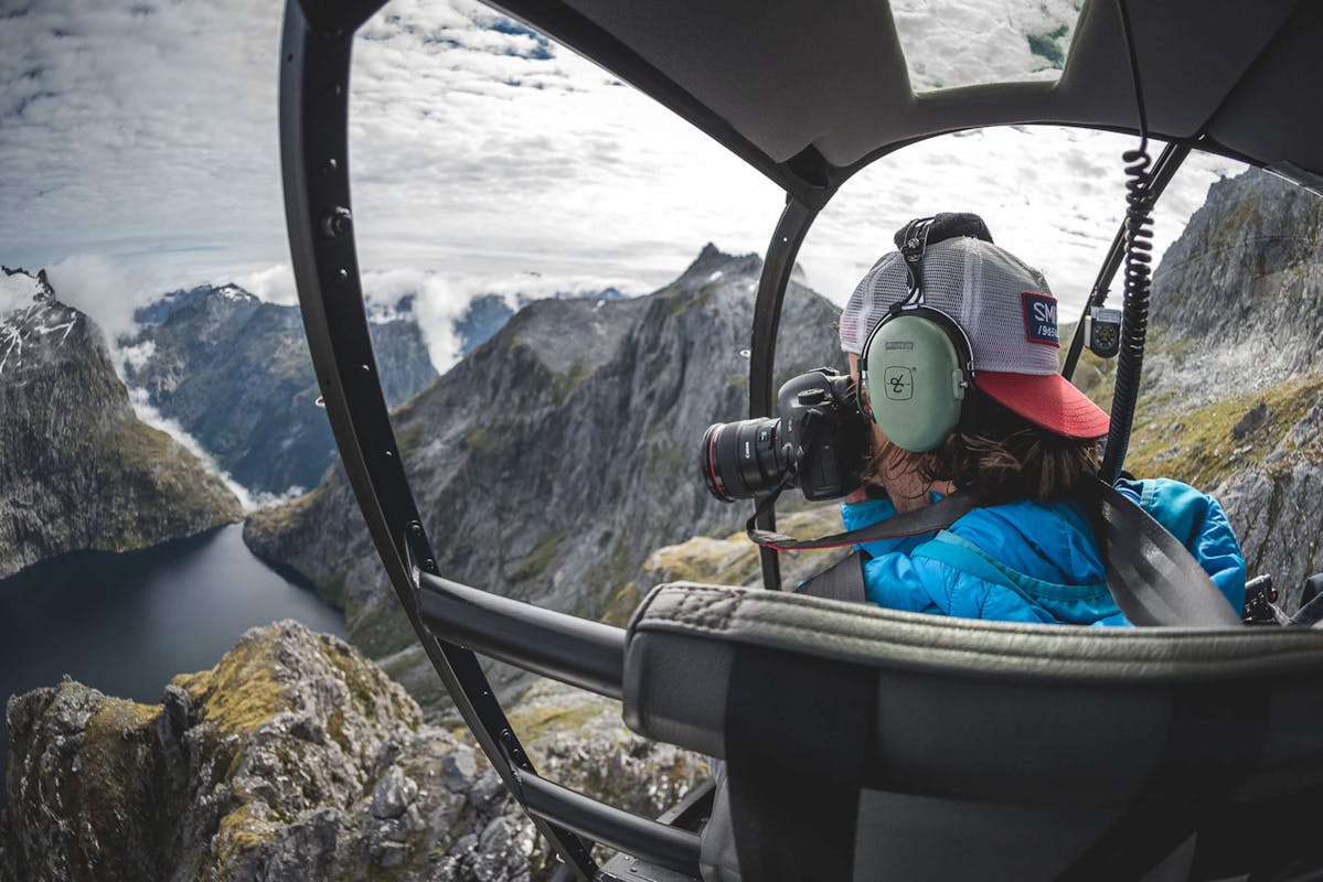 Joey Schusler taking a photo from a helicopter