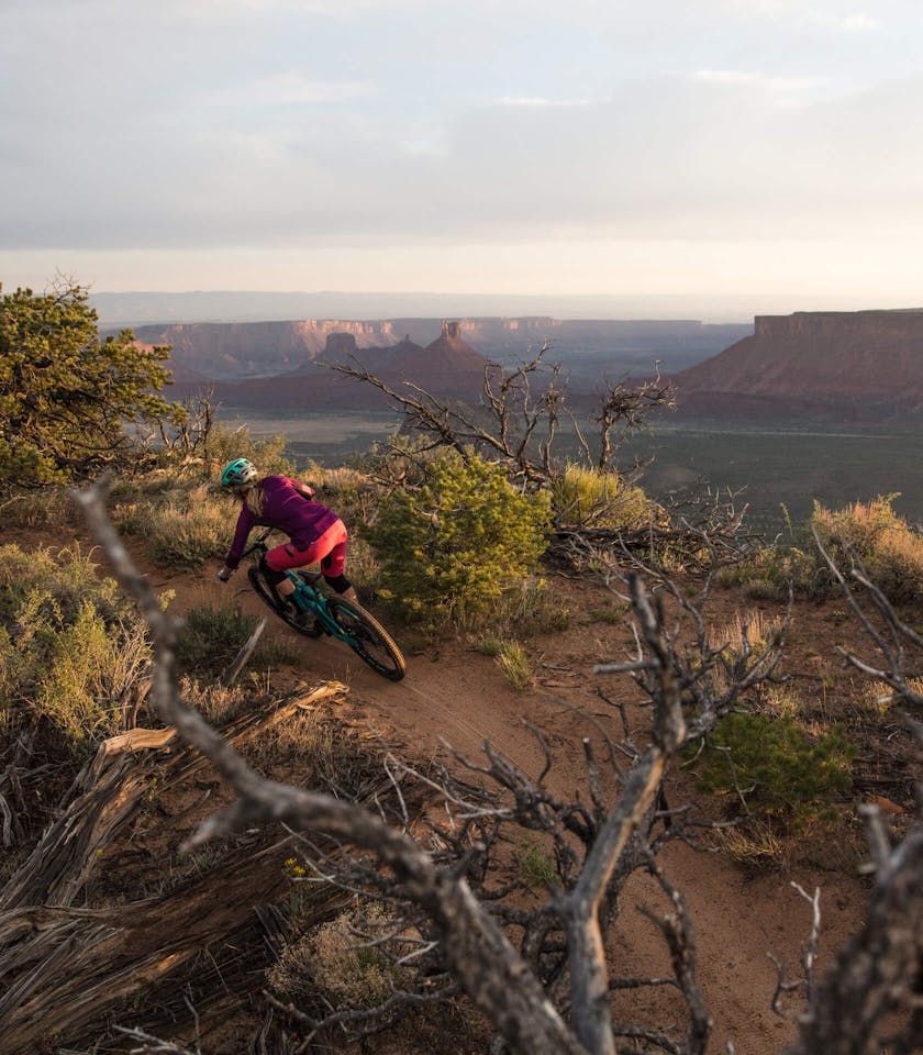 Sarah Rawley descending Porcupine Rim in Moab, UT